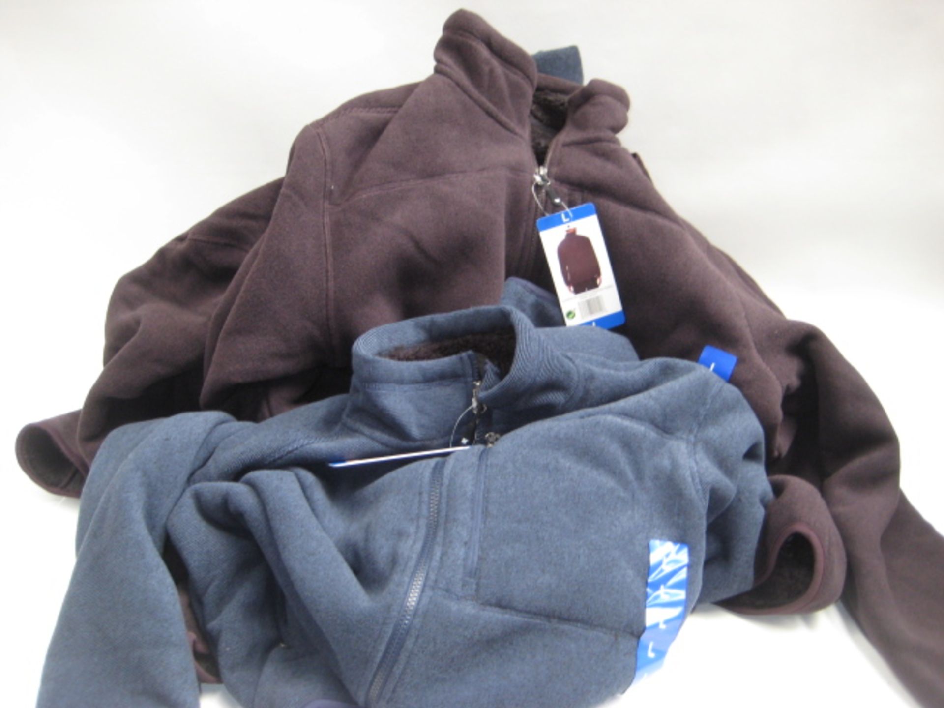 Bag containing 5 gents zip fleeces in burgundy and blue, sizes ranging from small to large