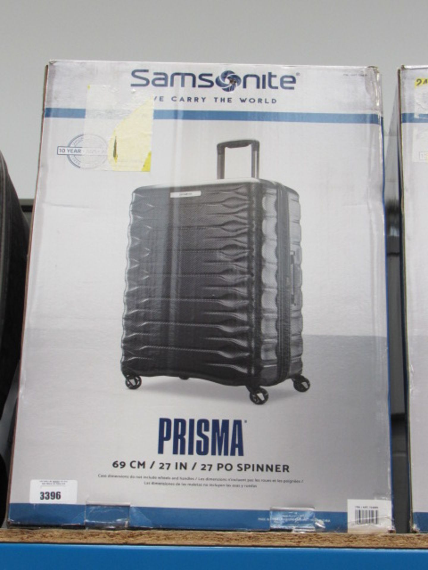 Large hard shelled Samsonite suitcase with box