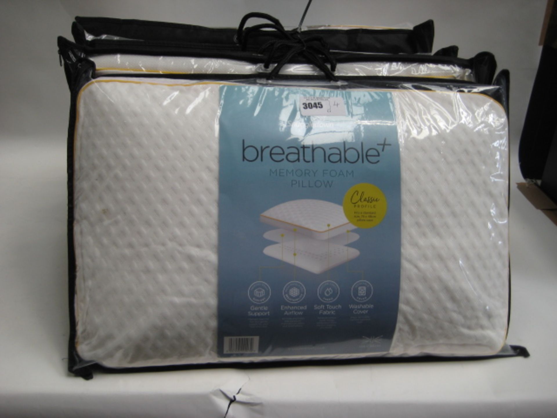 Four bagged Snuggle Down breathable memory foam pillows