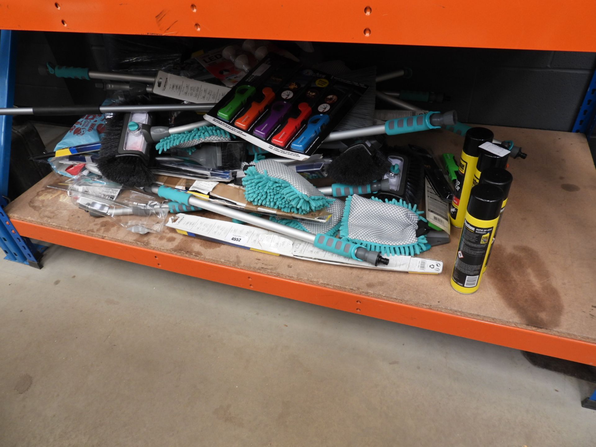 Large underbay of de-icer, cleaning cloths, wiper blades, brushes, etc