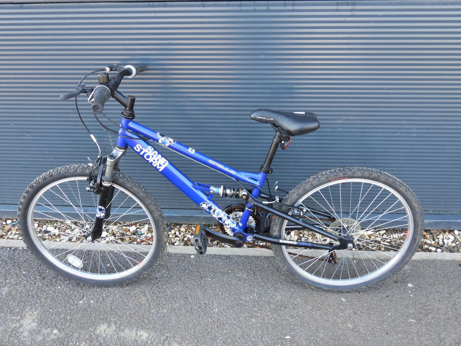 Blue childs Apollo mountain bike