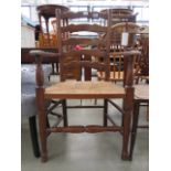 Oak ladder back armchair with strung seat