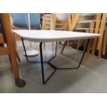 Cream painted coffee table with metal supports