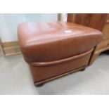 Brown leather footstool