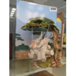 2 boxed Tuskers figures