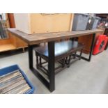 Stained pine dining table with metal supports