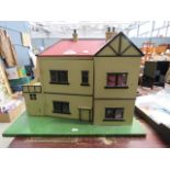 Painted dolls' house plus a quantity of furniture