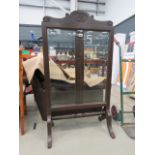 Glass and dark oak fire screen, with folding panels