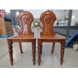 Pair of Victorian oak hall chairs