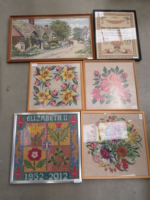 Quantity of cross stitch tapestries inc. flowers, Elizabeth II commemorative panel and country