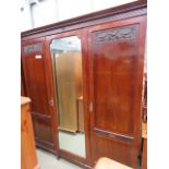 Walnut Edwardian triple wardrobe with central mirror