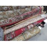 5125 Two floral carpets in red and beige