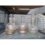 cage containing quantity of decanters and coasters