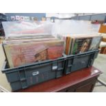 2 boxes containing vinyl records