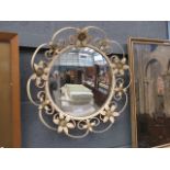 Circular convex mirror in cream painted wrought iron frame