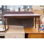 Reproduction mahogany coffee table on cabriole supports