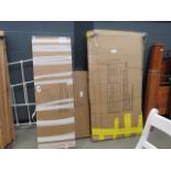 Three boxes containing bed and other furniture parts