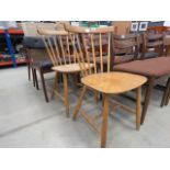 Pair of stick back teak dining chairs