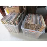 2 boxes containing vinyl records