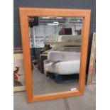 Rectangular bevelled mirror in pine frame