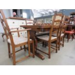 Ercol style drawer leaf table with 6 ladder back chairs inc. 2 carvers