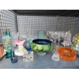 Cage containing quantity of wine glasses, jug, candlestick, bowls and vases