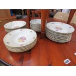 Quantity of rose patterned Czechoslovakian dinner plates and pudding bowls