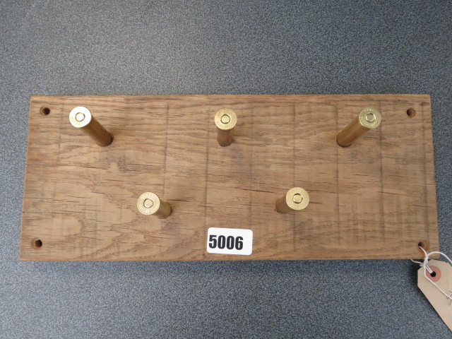 Dog lead rack with brass cartridge cases