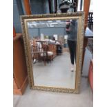 Rectangular bevelled mirror in gilt frame