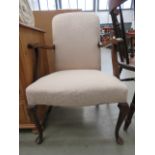Oak and floral fabric armchair