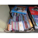 Box containing DVD's and CD's