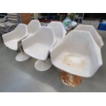 (2108MIDC) 265 - After Robin Day, a set of six white fibreglass armchairs on swivel tulip-type bases