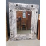 Rectangular bevelled mirror in distressed frame