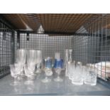 Cage containing wine and sherry glasses plus tumblers and vases