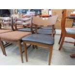 4 teak dining chairs with black rexine seats