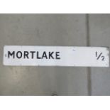 Painted metal Mortlake distance sign