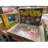 3 boxes containing childrens games