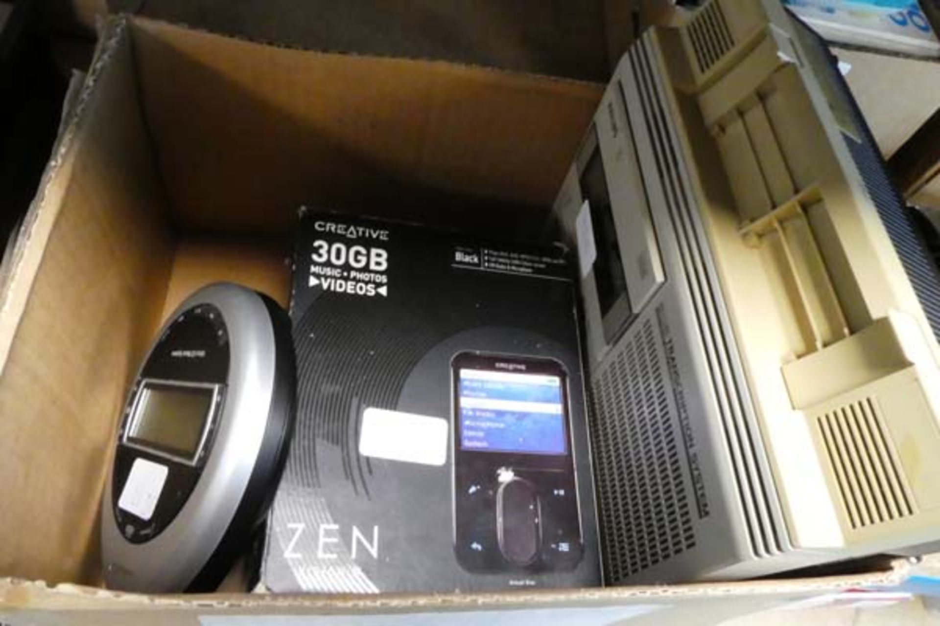 Philips 505 transcript system together with a Bose portable compact CD player and creative 30gb