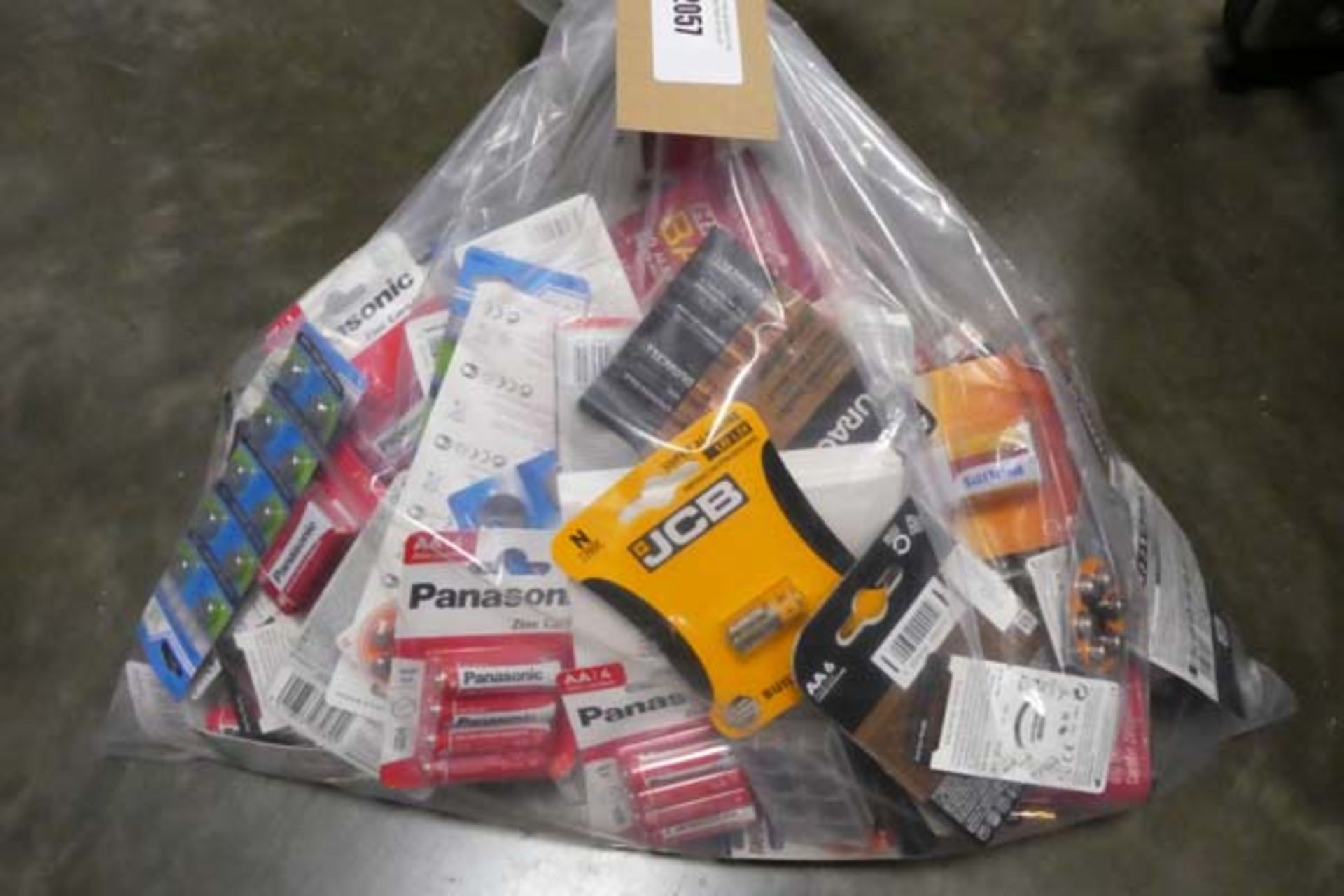 Bag containing quantity of batteries in various sizes