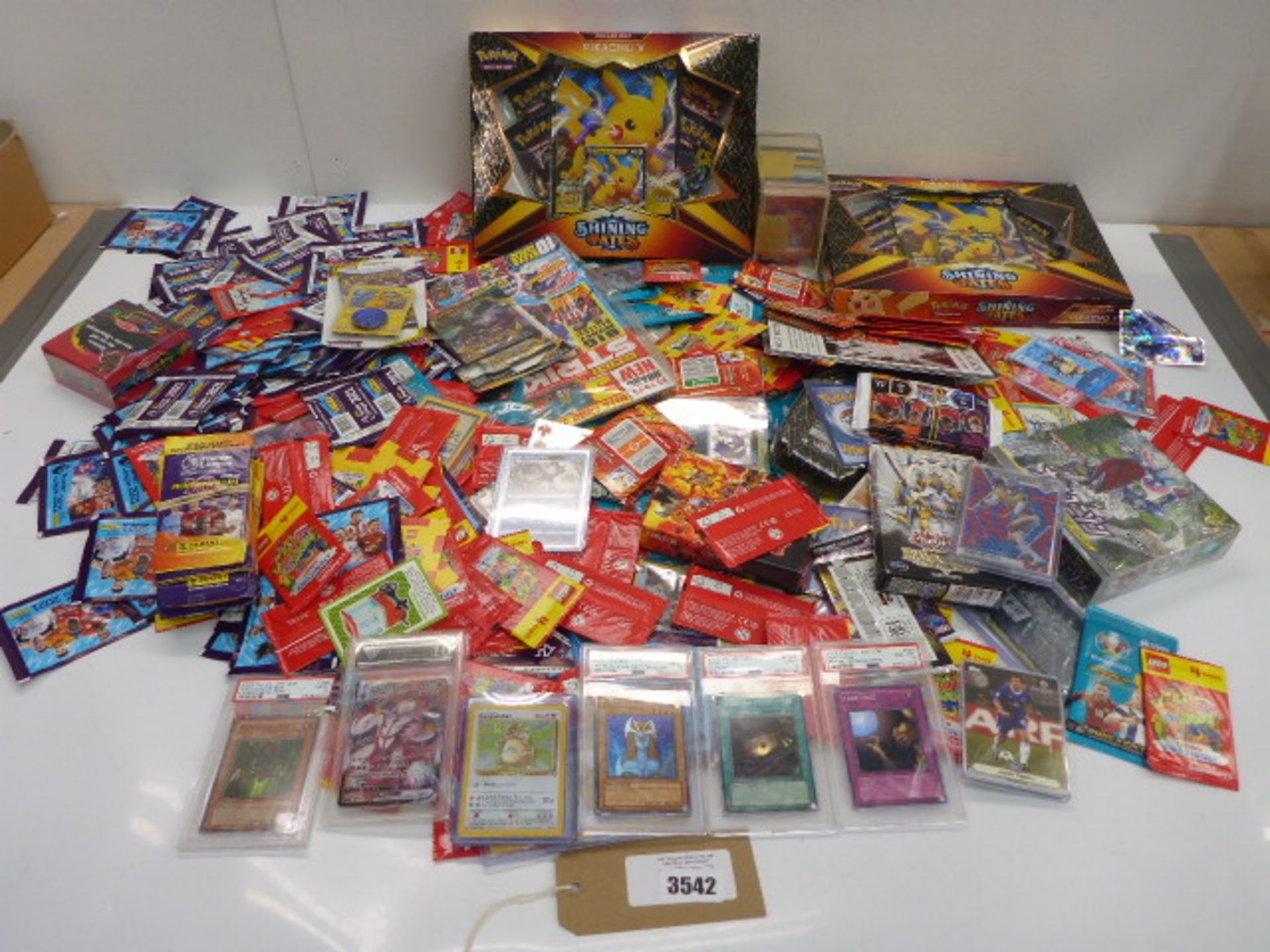 Large selection of collectable trading cards including Yu-Gi-Oh!, Pokemon, Pro Bowl, Panini, Lego