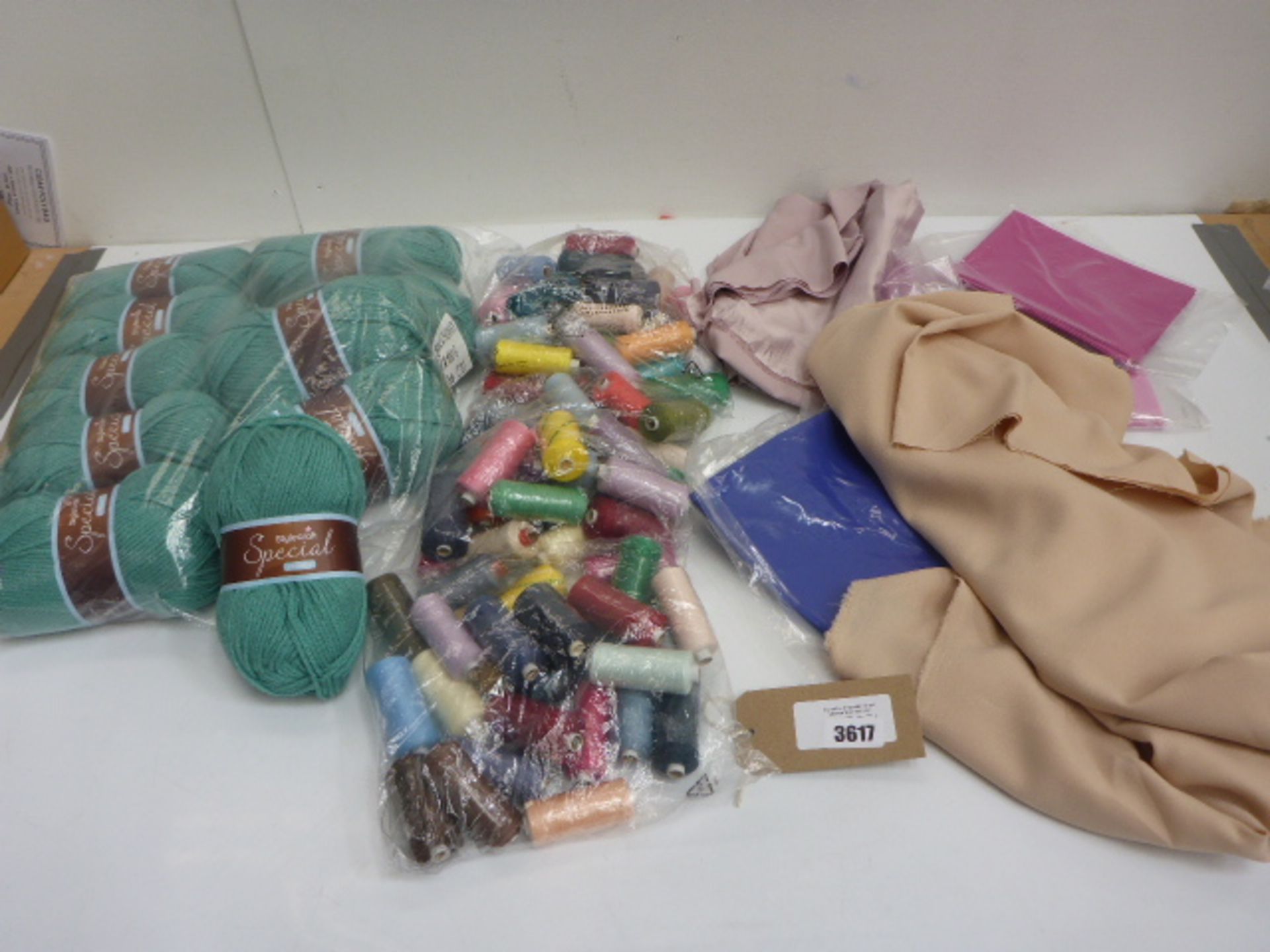 Quantity of Stylecraft Special chunky wool, reels of cotton and lengths of fabric