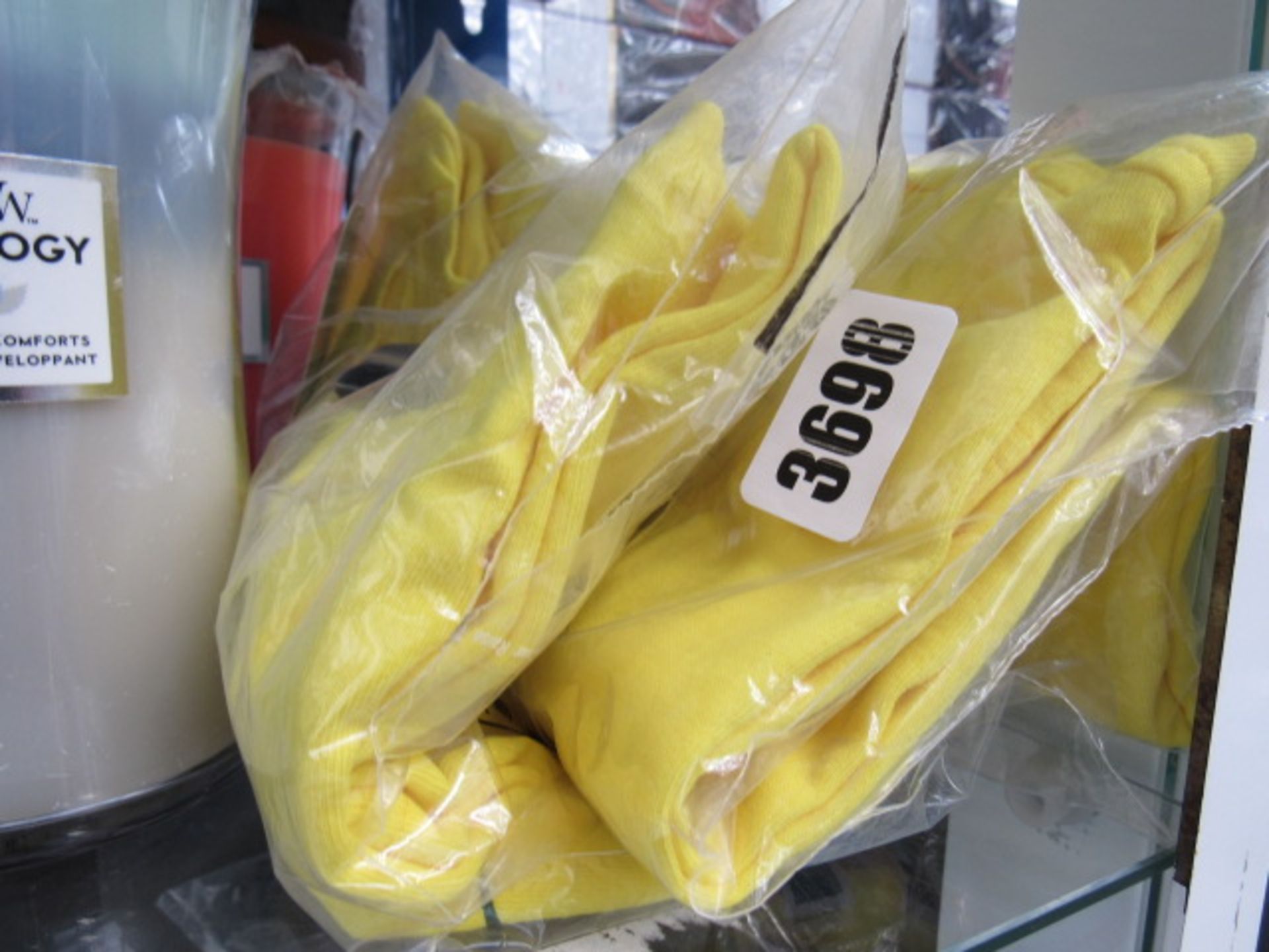 2 yellow Nike Supreme t shirts