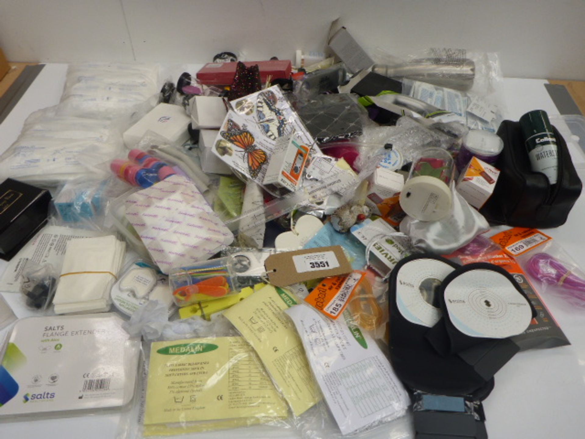 Large bag of household sundries, medical prosthetic socks, syringes, flange extender, sterile