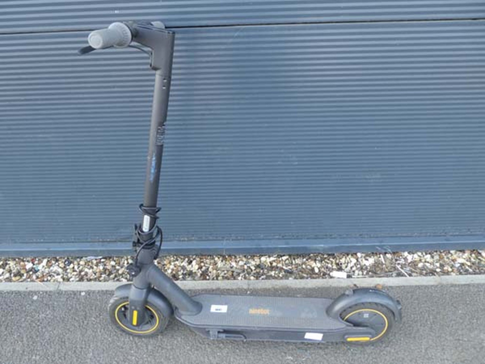 Ninebot electric scooter with charging lead