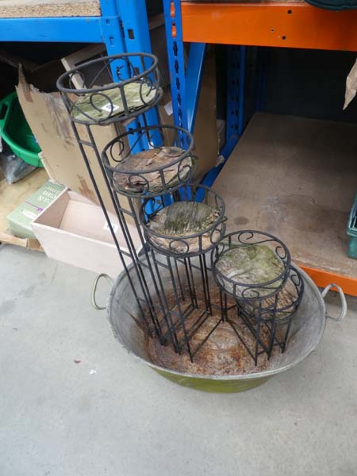 Galvanised container and a plant stand