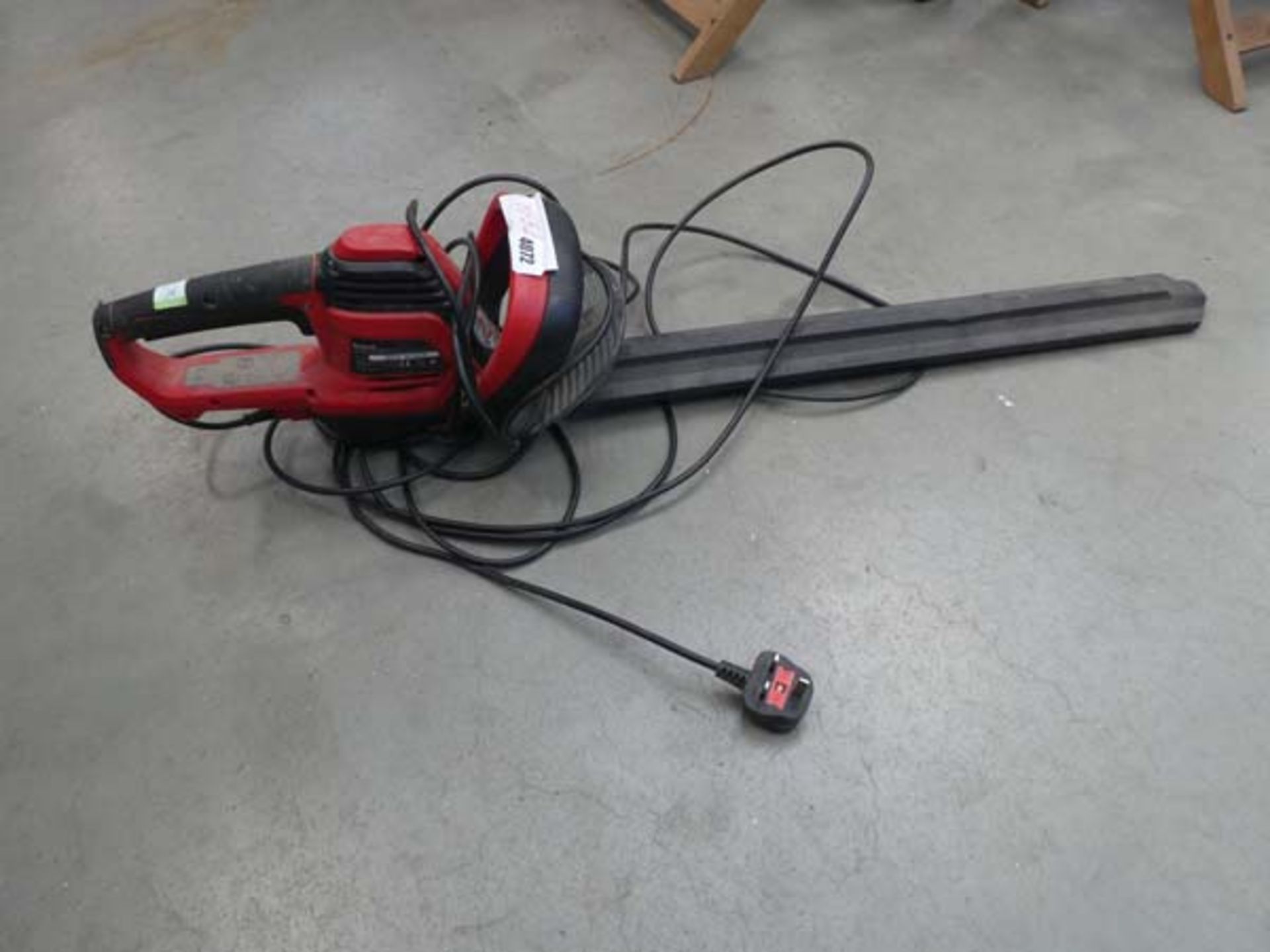 Red electric hedgecutter