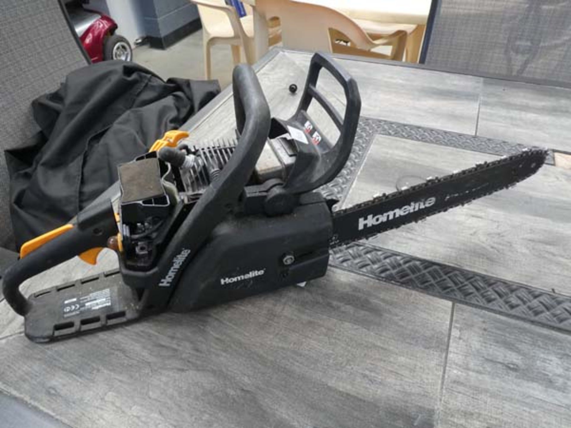 Homelight petrol powered chainsaw (no top cover)