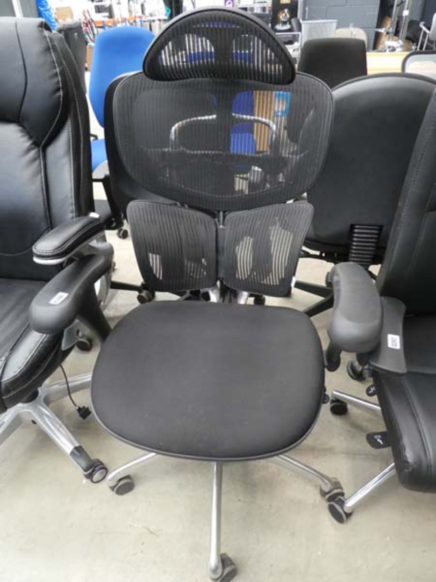 Black cloth mesh back swivel armchair