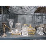 Cage containing a quantity of glassware and a silve rose vase