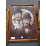 (4) Framed and glazed Laurel and Hardy print